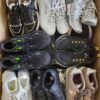 The photo shows a package with footwear in the category SH.