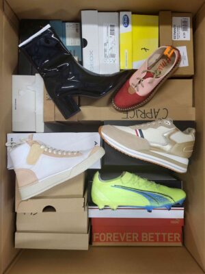 The photo shows a package with footwear in the category AS.