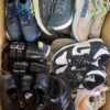 The photo shows a package with footwear in the category SH.