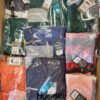 The photo shows a package with clothing in the category H.