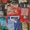 The photo shows a package with clothing in the category H.