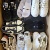 The photo shows a package with footwear in the category SH.