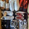 The photo shows a package with footwear in the category SH.
