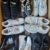 The photo shows a package with footwear in the category SH.