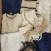 The photo shows a package with clothing in the category BSN.