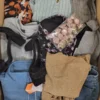 The photo shows a package with clothing in the category BSN.