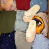 The photo shows a package with clothing in the category BSN.