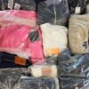 The photo shows a package with clothing in the category D.