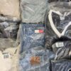 The photo shows a package with clothing in the category D.