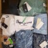 The photo shows a package with clothing in the category B.