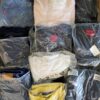 The photo shows a package with clothing in the category D.