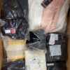 The photo shows a package with clothing in the category B.