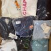 The photo shows a package with clothing in the category B.