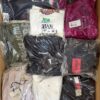The photo shows a package with clothing in the category B.