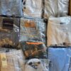The photo shows a package with clothing in the category D.