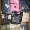 The photo shows a package with clothing in the category B.