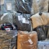 The photo shows a package with clothing in the category D.