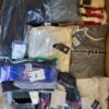 The photo shows a package with clothing in the category B.