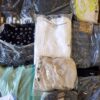 The photo shows a package with clothing in the category D.
