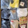 The photo shows a package with clothing in the category D.