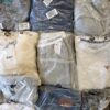 The photo shows a package with clothing in the category D.
