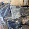 The photo shows a package with clothing in the category D.