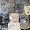 The photo shows a package with clothing in the category D.