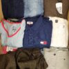 The photo shows a package with clothing in the category U.