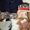 The photo shows a package with clothing in the category U.