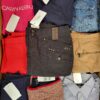 The photo shows a package with clothing in the category U.