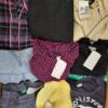 The photo shows a package with clothing in the category U.