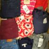 The photo shows a package with clothing in the category U.