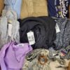 The photo shows a package with clothing in the category U.