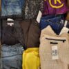 The photo shows a package with clothing in the category U.