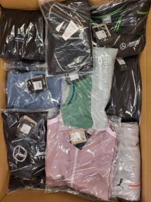 The photo shows a package with clothing in the category AP.