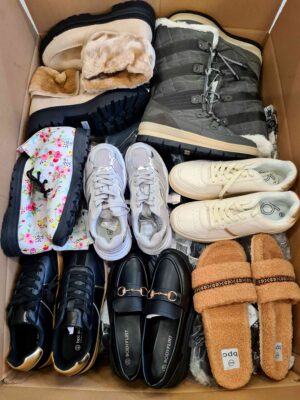 The photo shows a package with clothing in the category BPS.