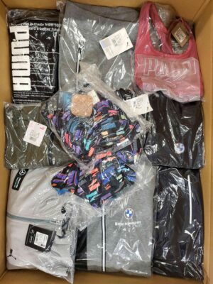 The photo shows a package with clothing in the category AP.