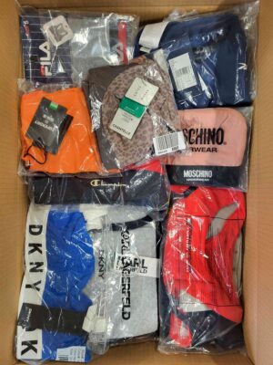 The photo shows a package with clothing in the category AU.