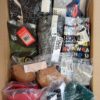 The photo shows a package with clothing in the category AU.