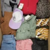 The photo shows a package with clothing in the category TSC.