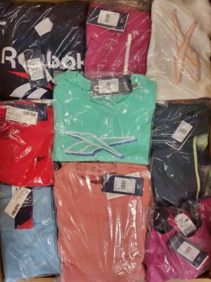 The photo shows a package with clothing in the category R.