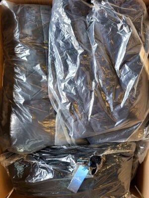 The photo shows a package with clothing in the category AJW.