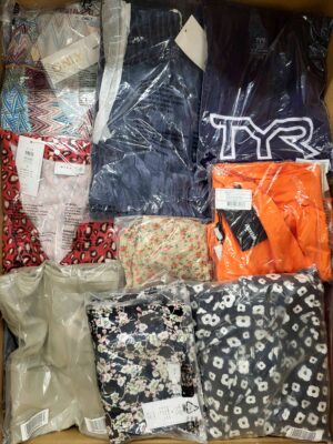 The photo shows a package with clothing in the category AR.