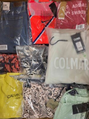 The photo shows a package with clothing in the category AW.