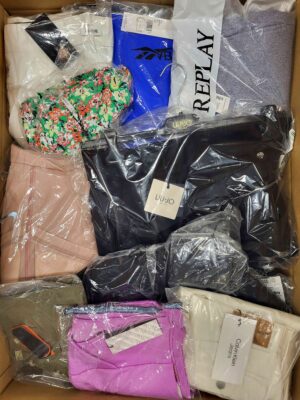 The photo shows a package with clothing in the category AW.