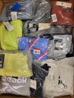 The photo shows a package with clothing in the category AW.
