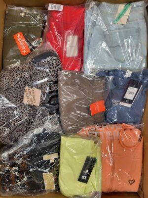 The photo shows a package with clothing in the category AW.