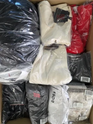 The photo shows a package with clothing in the category C.