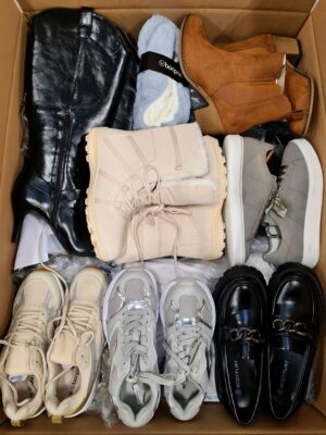 The photo shows a package with clothing in the category BPS.