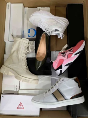 The photo shows a package with footwear in the category BS.